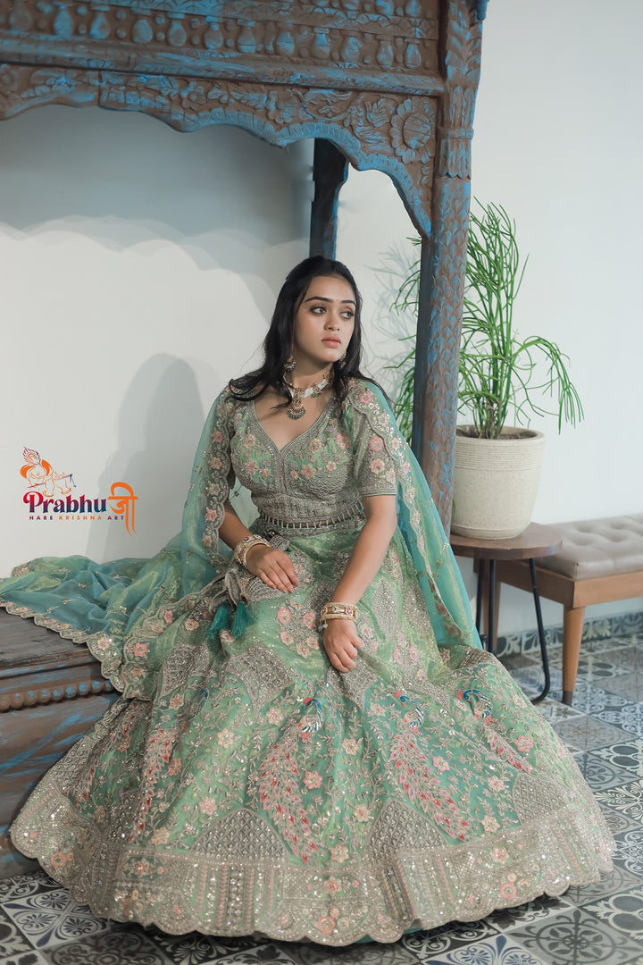 Mint Green Heavy Embroidered Designer Lehenga Choli with Net Dupatta