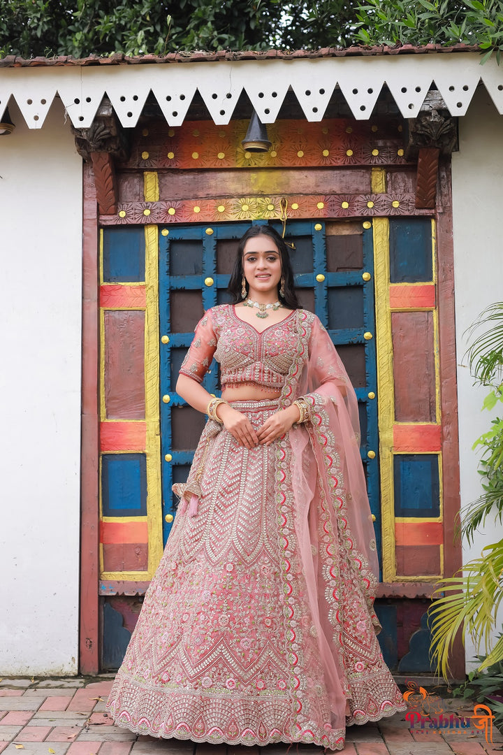 Blush Pink Heavy Embroidered Bridal Lehenga Choli with Net Dupatta