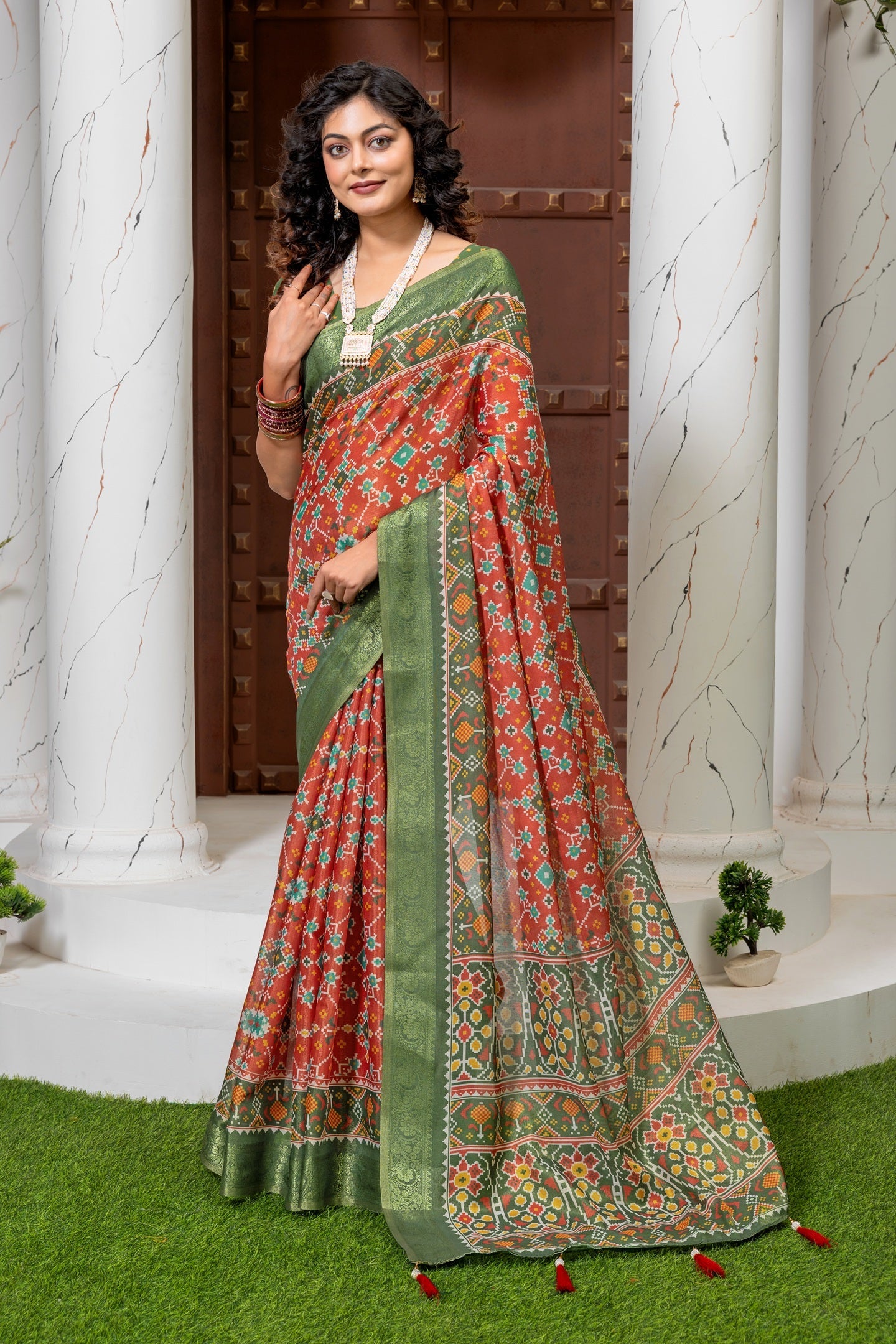 Vibrant Red & Green Heritage Patola Print Silk Blend Saree