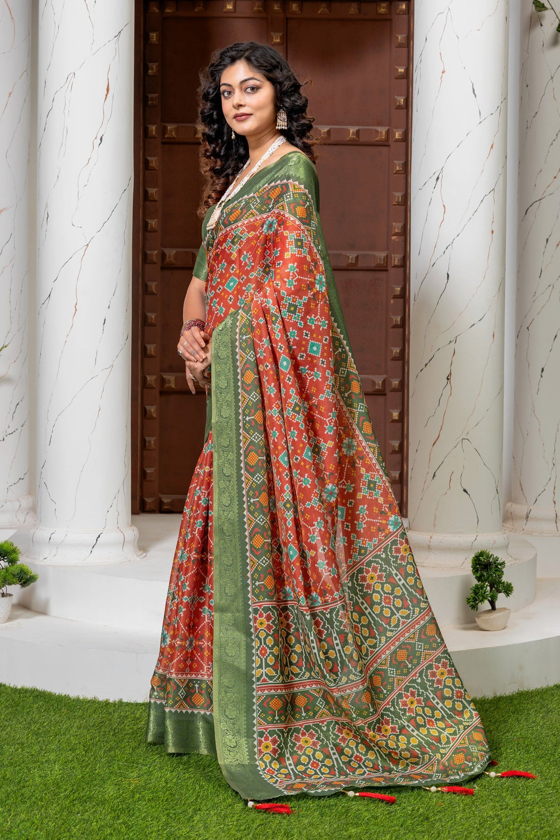 Vibrant Red & Green Heritage Patola Print Silk Blend Saree
