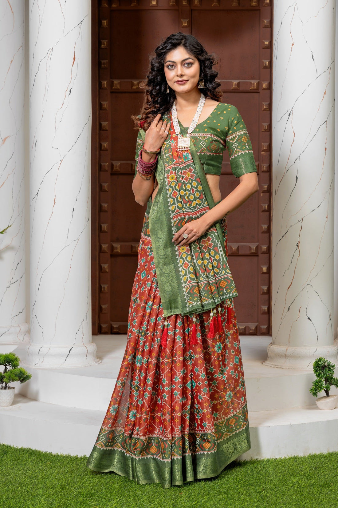 Vibrant Red & Green Heritage Patola Print Silk Blend Saree