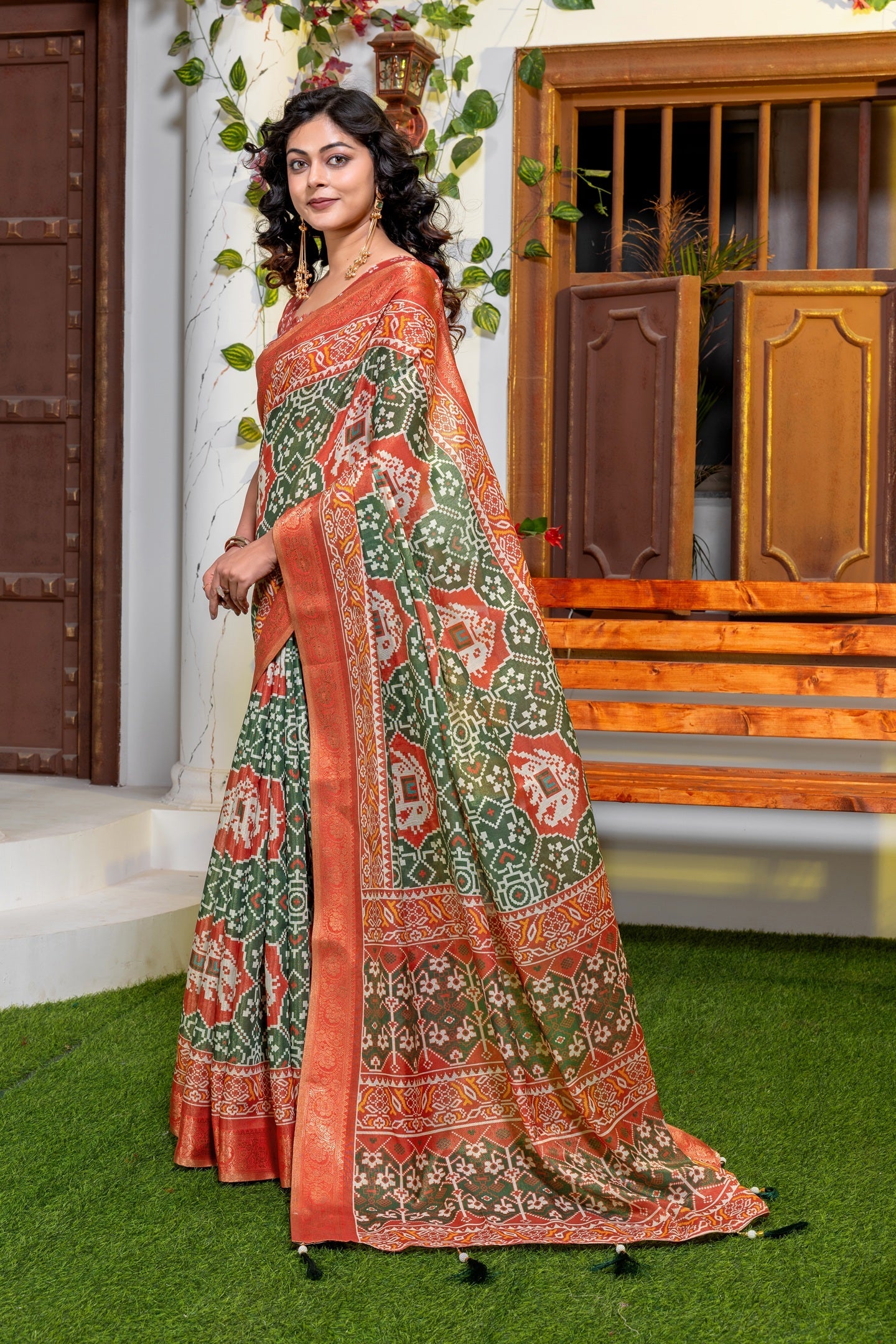 Vibrant Green & Rust Traditional Patola Print Banarasi Silk Saree