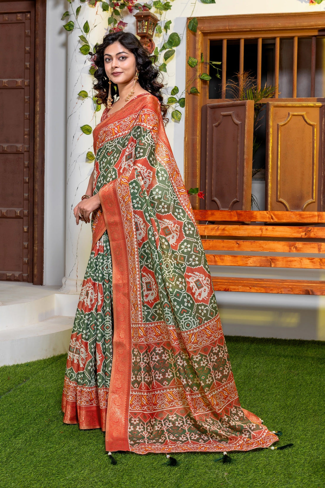 Vibrant Green & Rust Traditional Patola Print Banarasi Silk Saree