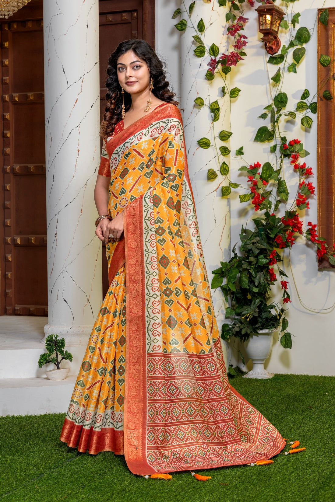 Elegant Mustard Yellow Patola Silk Saree with Rich Red Zari Border
