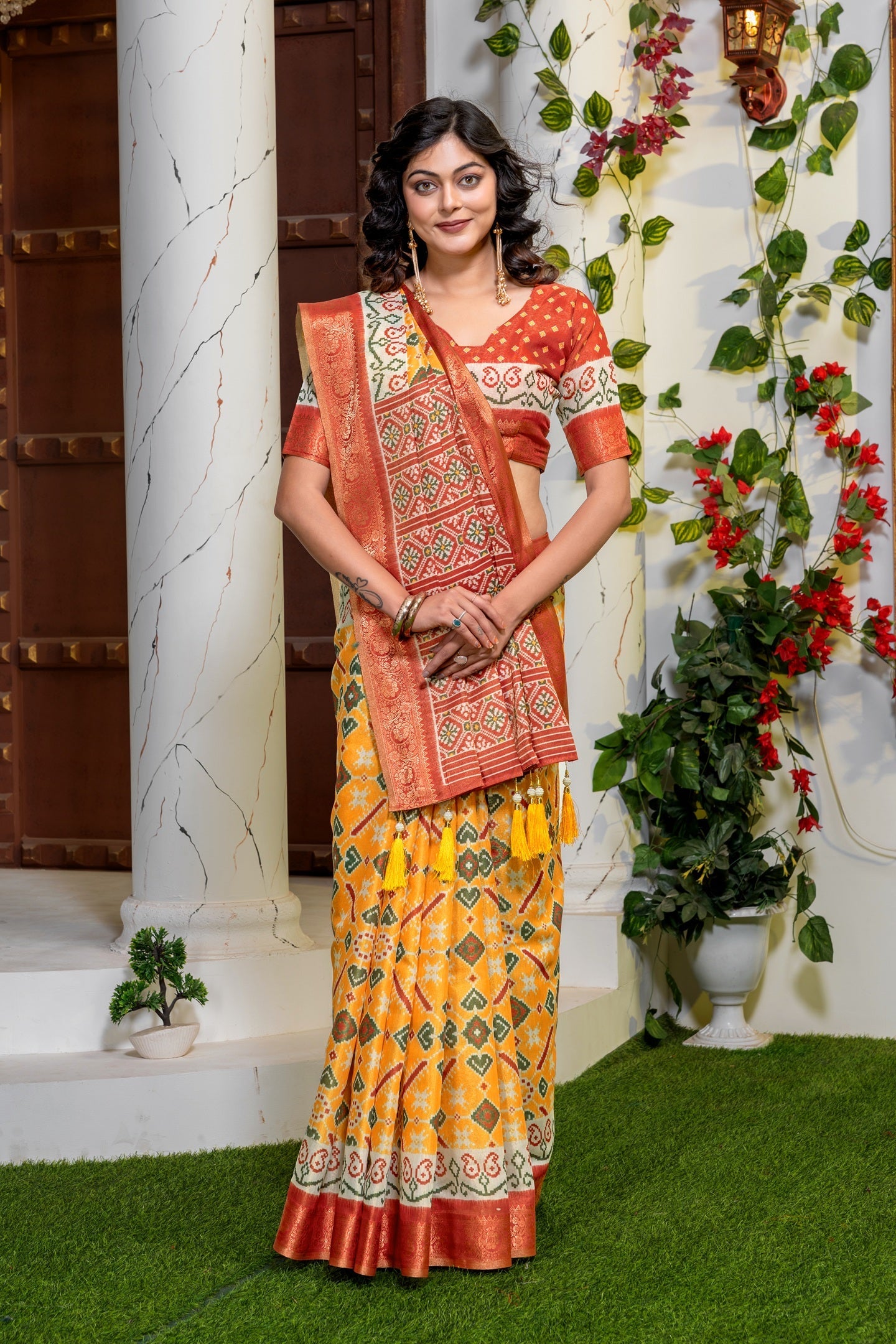 Elegant Mustard Yellow Patola Silk Saree with Rich Red Zari Border