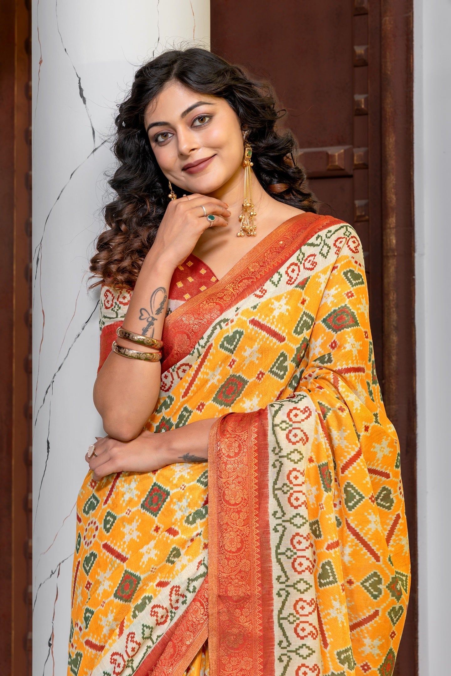 Vibrant Multi-Color Patola Print Art Silk Saree with Zari Border