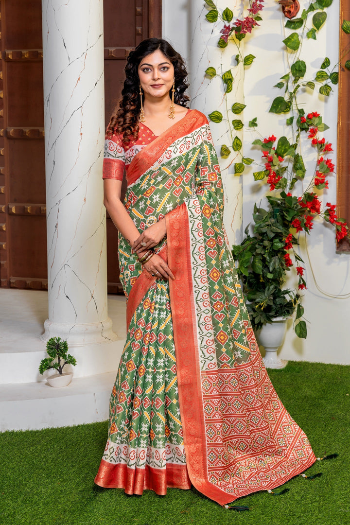Vibrant Green Patola Silk Saree with Elegant Zari Border
