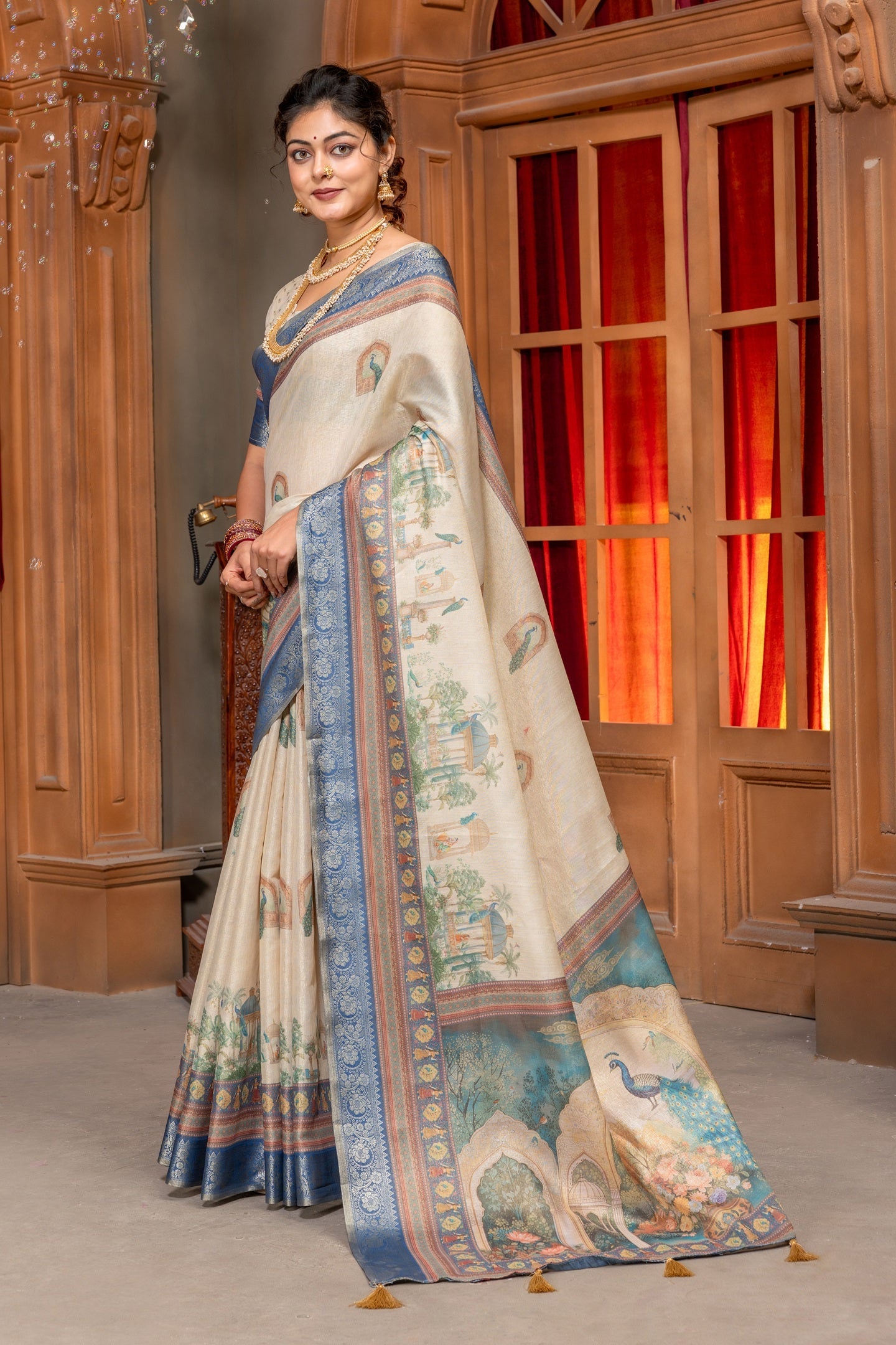 Regal Off-White Tussar Silk Saree with Intricate Pichwai Art & Zari Border